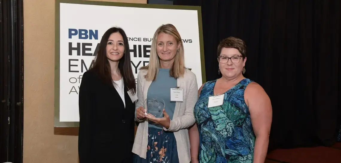 Beacon employees accepting PBN Healthy Employer Award