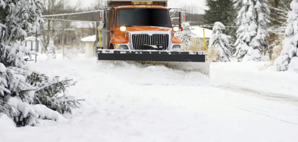 Truck out snowplowing