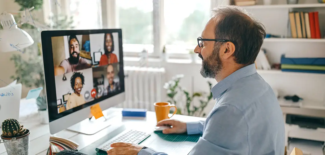 Man in online computer meeting